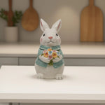 Load image into Gallery viewer, Blue Bunny Cookie Stasher Ceramic bunny figurines with flower baskets for Easter decor | Hand-painted ceramic bunny| Whimsical spring decor ceramic bunnies | Bunny Cookie Stasher | Cute cookie Stasher | Home Decor | Kitchen Ware