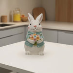 Load image into Gallery viewer, Blue Bunny Cookie Stasher Ceramic bunny figurines with flower baskets for Easter decor | Hand-painted ceramic bunny| Whimsical spring decor ceramic bunnies | Bunny Cookie Stasher | Cute cookie Stasher | Home Decor | Kitchen Ware