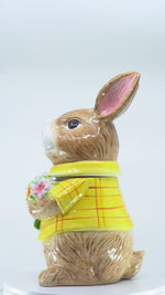 Load and play video in Gallery viewer, Yellow Bunny Cookie Stasher - Ceramic bunny figurines with flower baskets for Easter decor | Hand-painted ceramic bunny| Whimsical spring decor ceramic bunnies | Bunny Cookie Stasher | Cute cookie Stasher | Home Decor | Kitchen Ware
