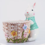 Load and play video in Gallery viewer, Bunny with Basket Kitchen Decor - Ceramic bunny figurines with flower baskets for Easter decor | Hand-painted ceramic bunny| Whimsical spring decor ceramic bunnies | Kitchen Ware
